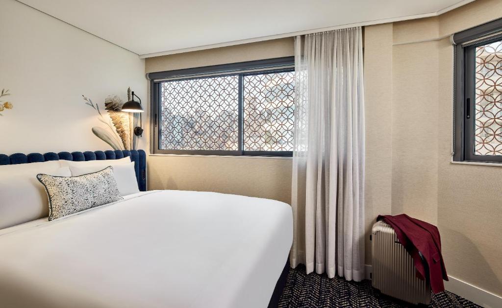 Postel nebo postele na pokoji v ubytování Aiden by Best Western Darling Harbour