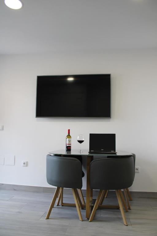 Telewizja i/lub zestaw kina domowego w obiekcie Estudio NUEVO Minerva 635