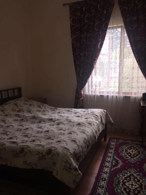 Postel nebo postele na pokoji v ubytování Гостевой дом Кристина