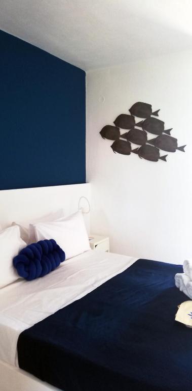 Postel nebo postele na pokoji v ubytování Rigas Rooms