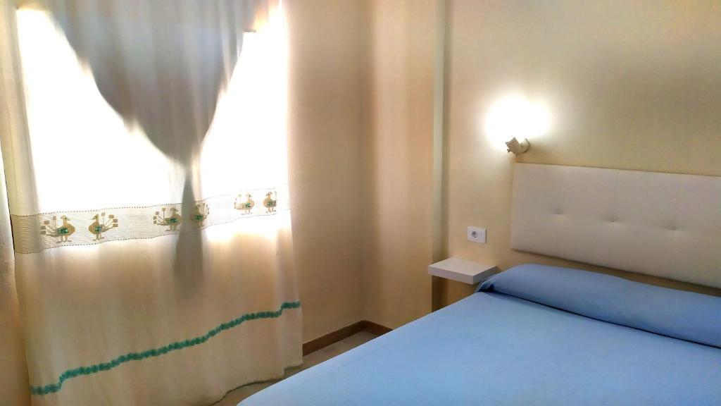 Łóżko lub łóżka w pokoju w obiekcie Holiday rent Fuerteventura