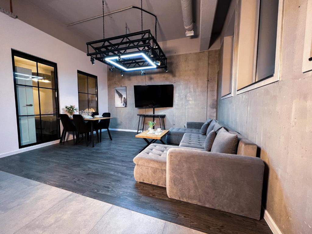 Televízia a/alebo spoločenská miestnosť v ubytovaní MojeMiędzyzdroje LU 7B - Luksusowy apartament 100 metrów od morza
