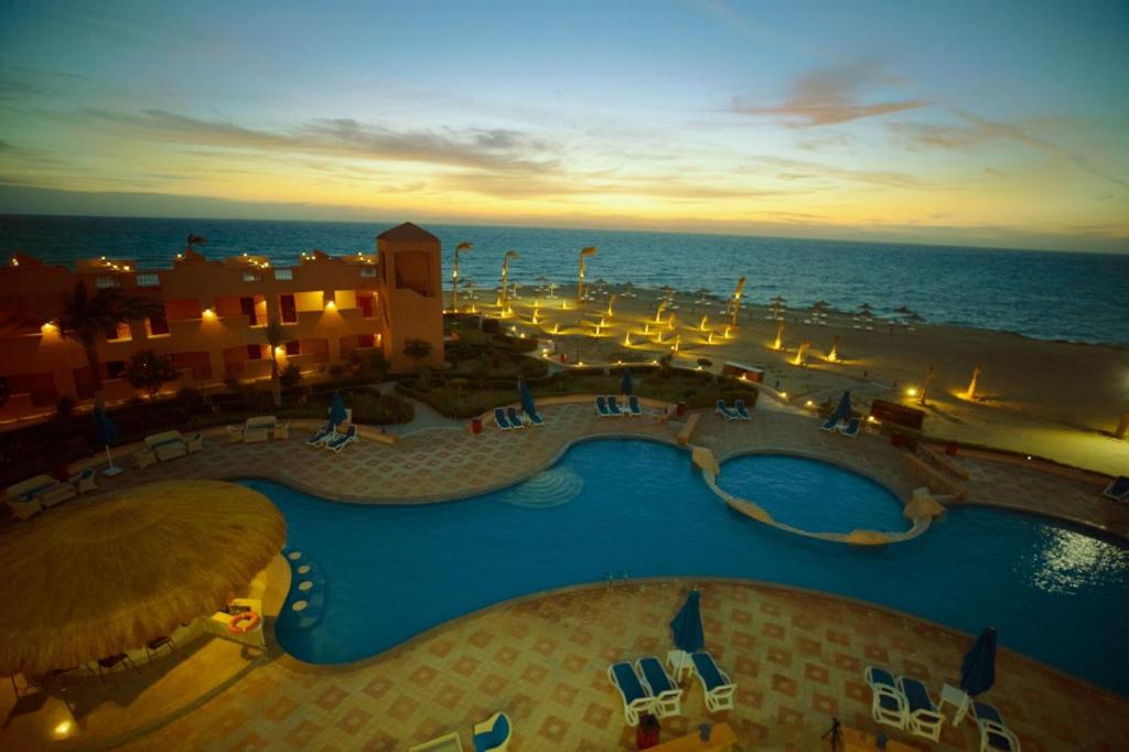 a view of a swimming pool at a resort at Stay Inn Hotel Ain Sokhna in Ain Sokhna
