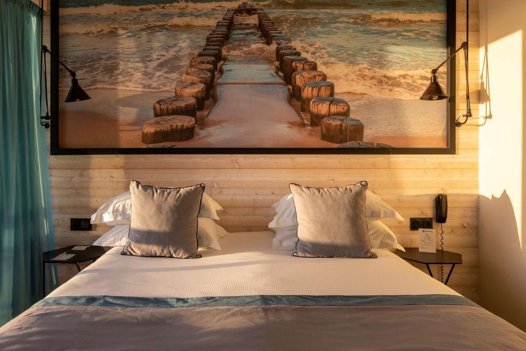 Postel nebo postele na pokoji v ubytování Best Western Plus Hotel Canet-Plage