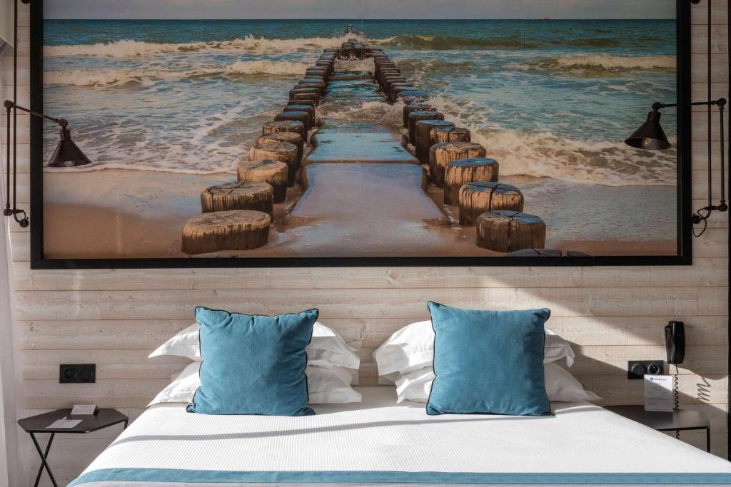 Postel nebo postele na pokoji v ubytování Best Western Plus Hotel Canet-Plage