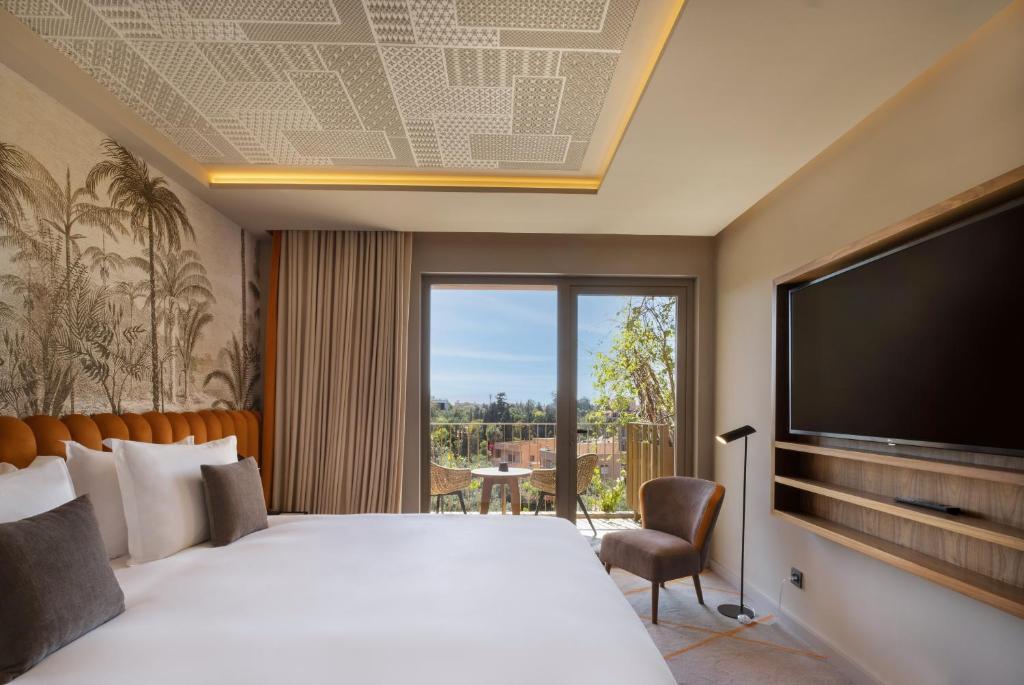 Postel nebo postele na pokoji v ubytování Hotel Jadali & Spa