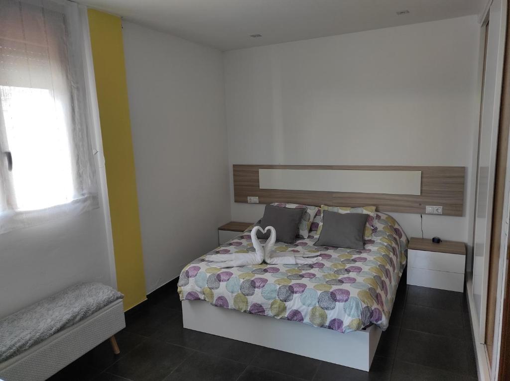 Posteľ alebo postele v izbe v ubytovaní Casa vacacional illa de arousa