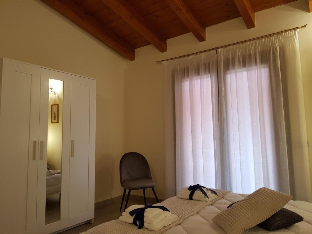 A bed or beds in a room at Grace dell'isola dei Coralli
