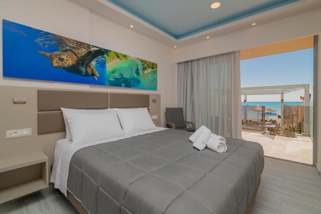 Postel nebo postele na pokoji v ubytování Sea Diamond Suites