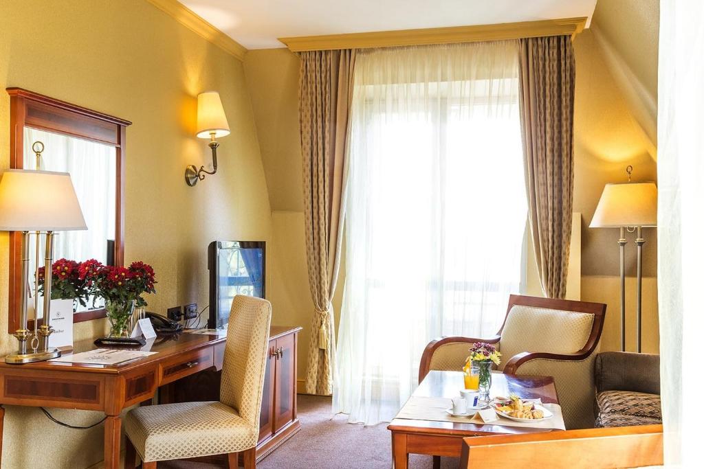 Posezení v ubytování Romance Hotel and Family Suites