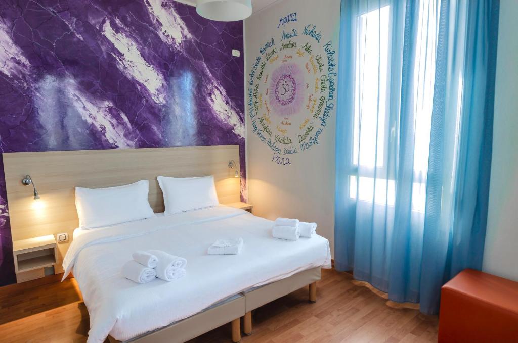 Postel nebo postele na pokoji v ubytování Hotel Villa La Brise