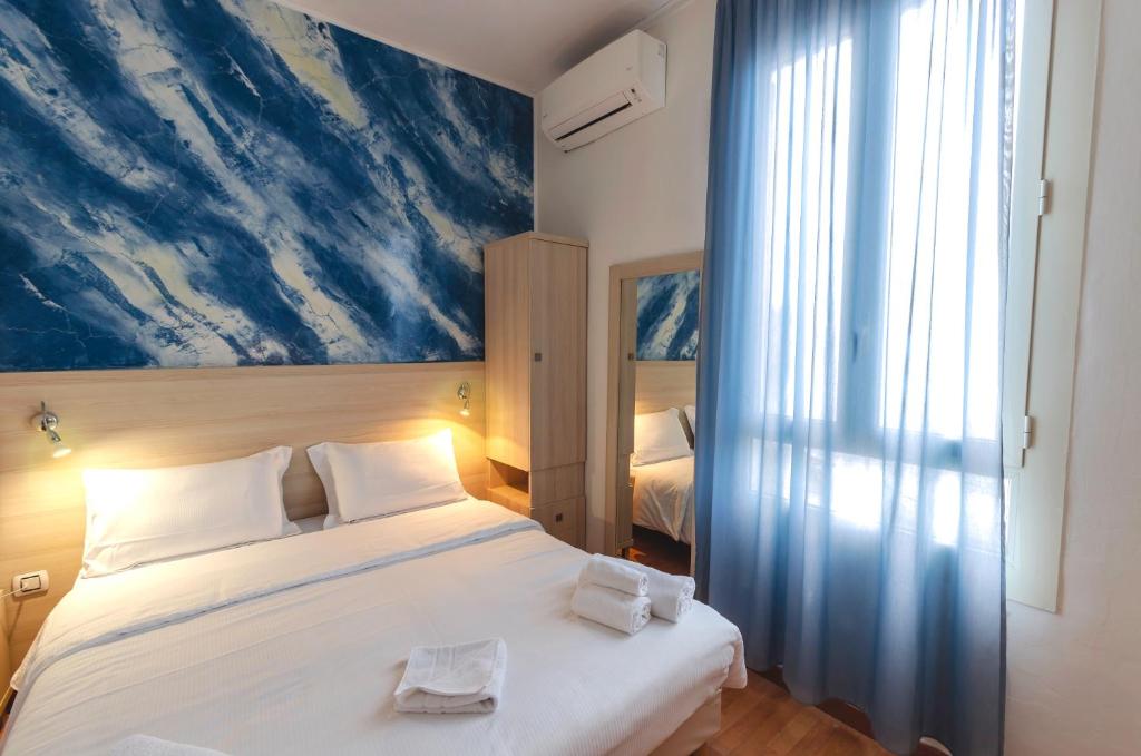 Postel nebo postele na pokoji v ubytování Hotel Villa La Brise