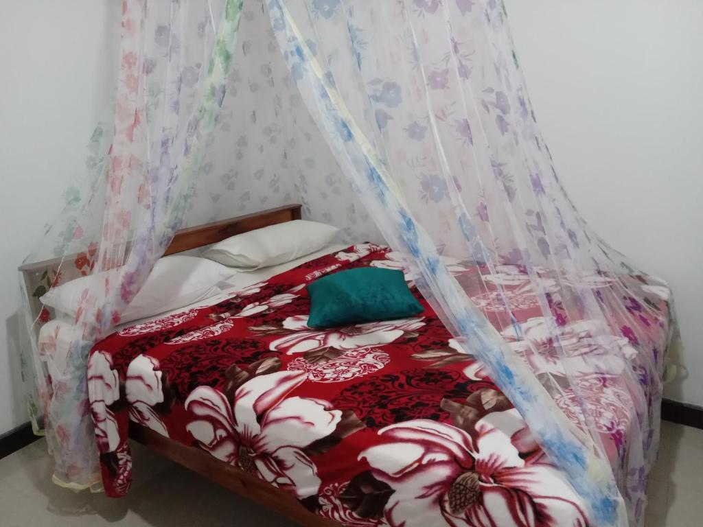 Postel nebo postele na pokoji v ubytování Lavendra Guset House