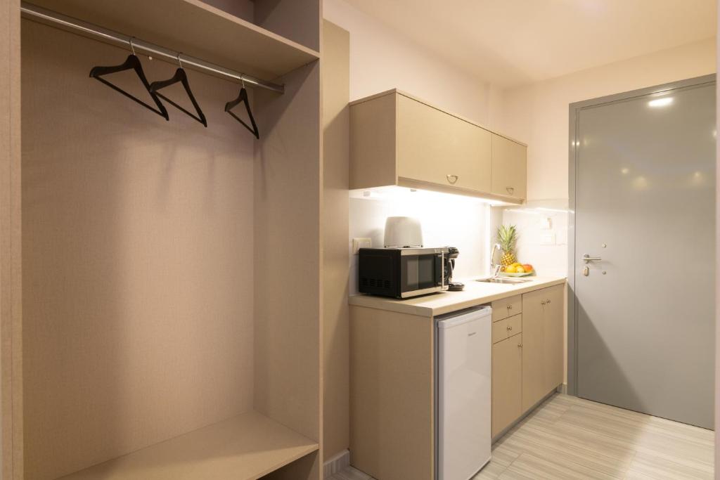 Kuchyň nebo kuchyňský kout v ubytování Sea Diamond Suites