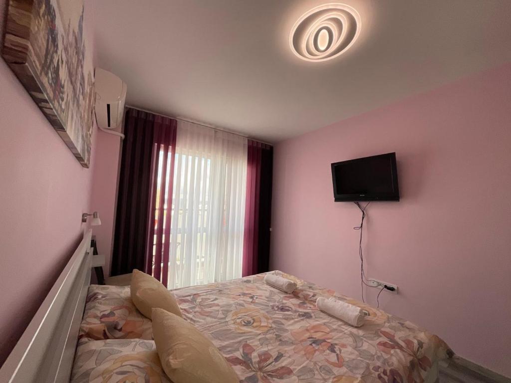Postel nebo postele na pokoji v ubytování Nataly Homes