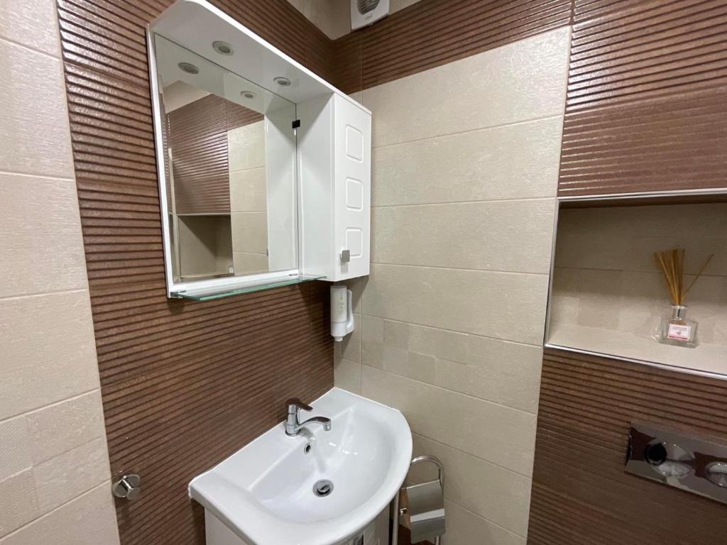 Koupelna v ubytování Nataly Homes