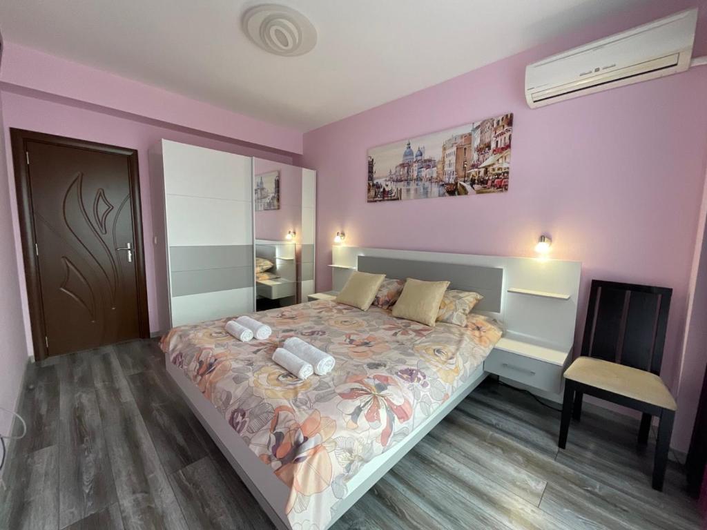 Postel nebo postele na pokoji v ubytování Nataly Homes