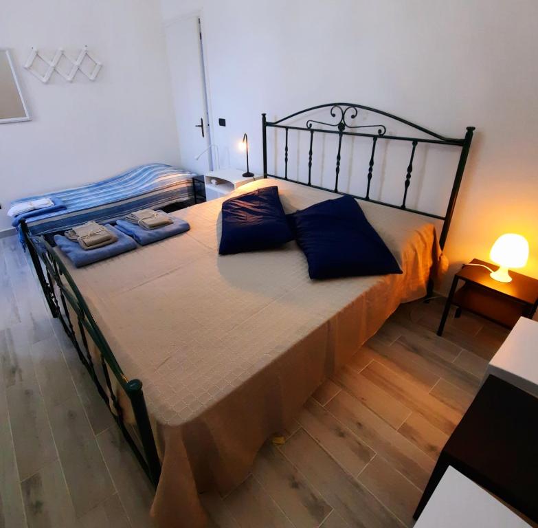 Postel nebo postele na pokoji v ubytování Blu Salento