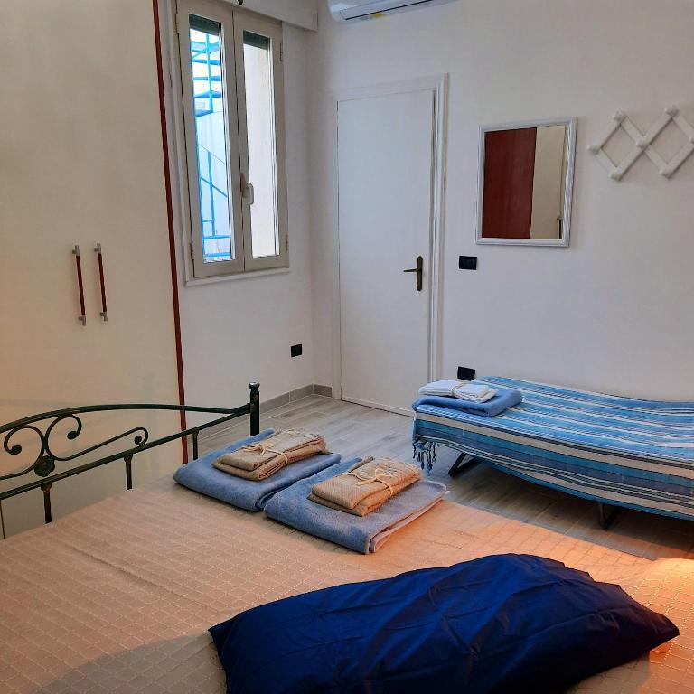 Postel nebo postele na pokoji v ubytování Blu Salento