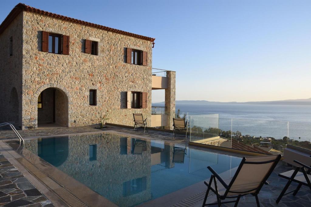 The swimming pool at or close to Villa Dafni - Infinite Sea Vistas with Private Pool