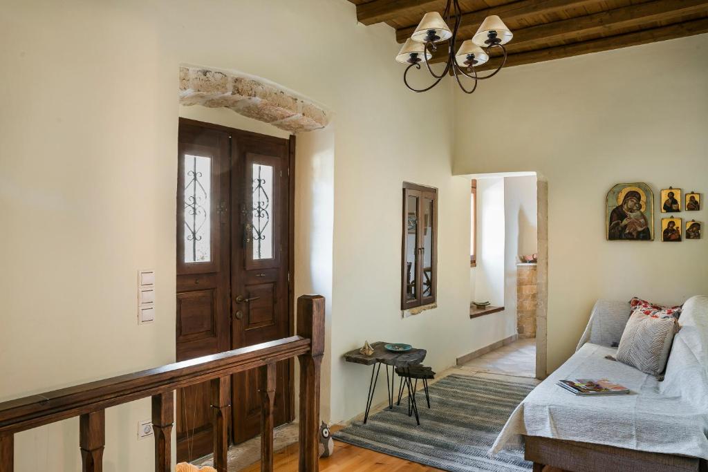 A bed or beds in a room at Traditional Stone House Anofli 1843 Fiskardo Kefalonia