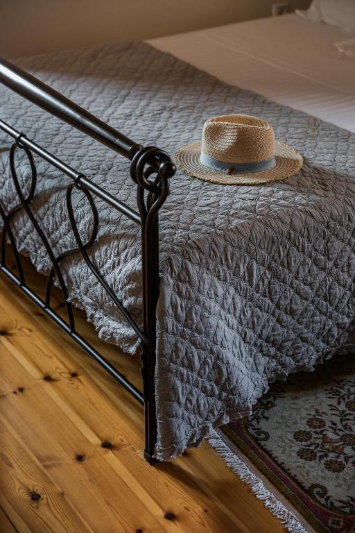 A bed or beds in a room at Traditional Stone House Anofli 1843 Fiskardo Kefalonia