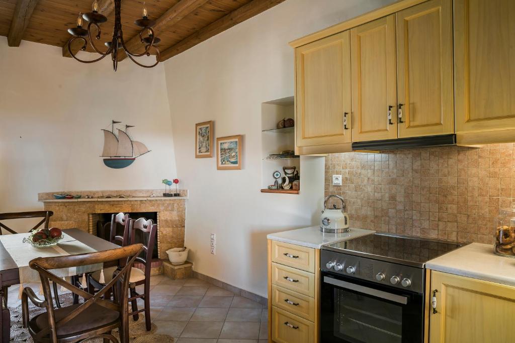 A kitchen or kitchenette at Traditional Stone House Anofli 1843 Fiskardo Kefalonia