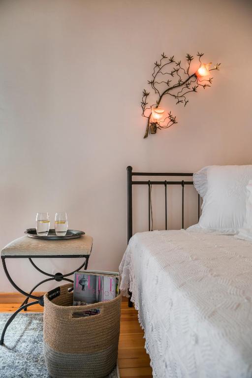 A bed or beds in a room at Traditional Stone House Anofli 1843 Fiskardo Kefalonia