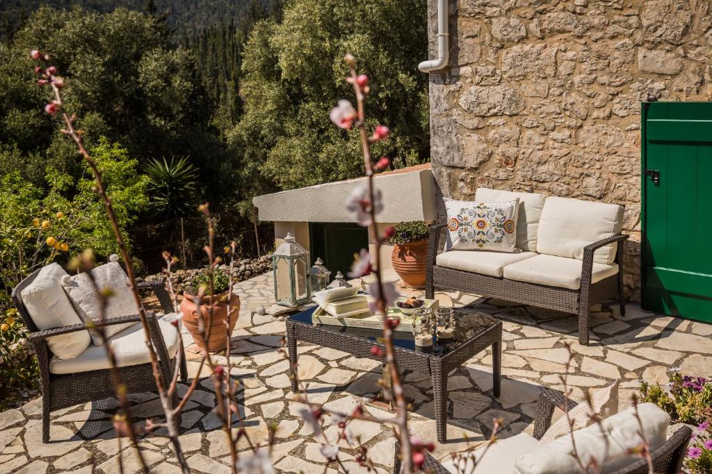 A seating area at Traditional Stone House Anofli 1843 Fiskardo Kefalonia