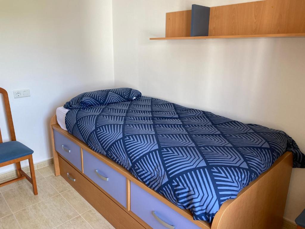 Posteľ alebo postele v izbe v ubytovaní Casa a L’Escala, piscina comunitaria, Mallols