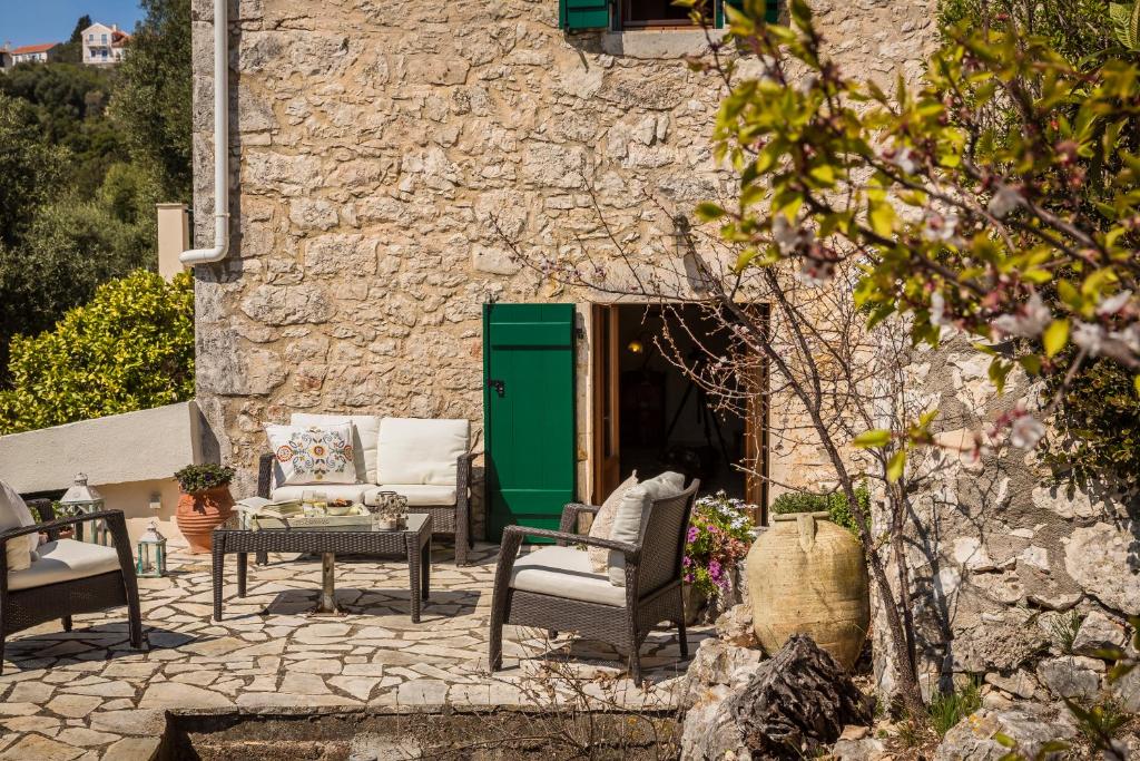A patio or other outdoor area at Traditional Stone House Anofli 1843 Fiskardo Kefalonia