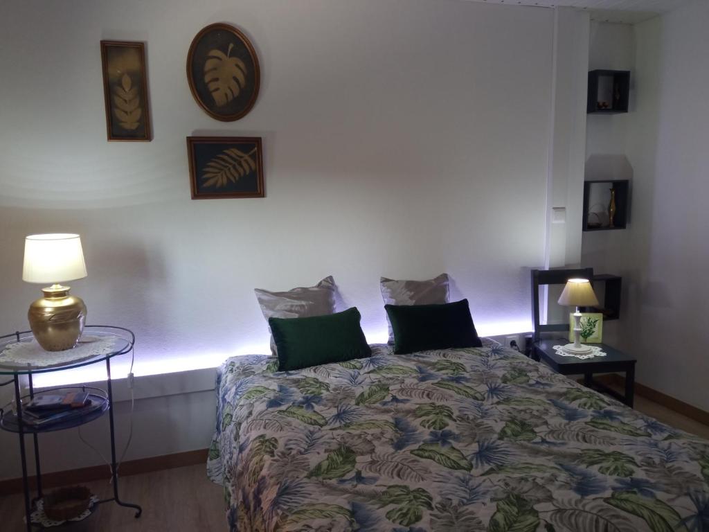 Кровать или кровати в номере Azevinho Guest House