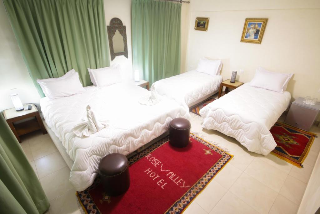 Postel nebo postele na pokoji v ubytování Rose Valley Hotel