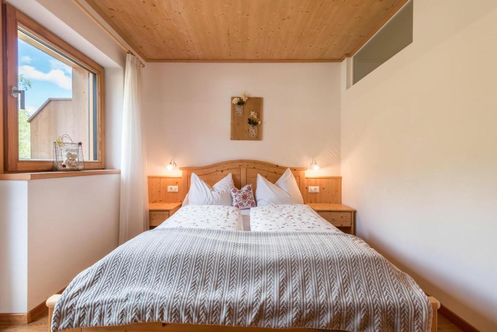 Postel nebo postele na pokoji v ubytování Huberhof App Rubens