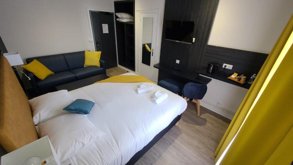 Кровать или кровати в номере Hotel Le Cosy Riva Bella