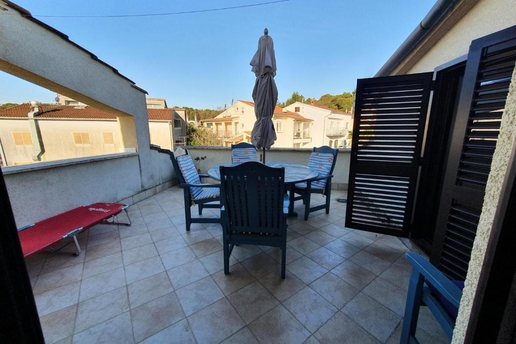 Balkón alebo terasa v ubytovaní Apartment Relax for max 5 persons Funtana close to the beach