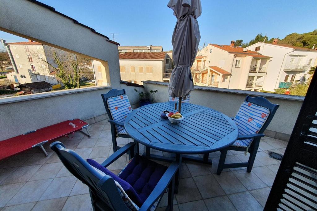 Balkón alebo terasa v ubytovaní Apartment Relax for max 5 persons Funtana close to the beach