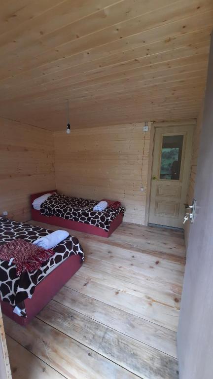 Postel nebo postele na pokoji v ubytování Guesthouse Pirimze