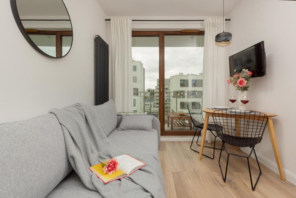 Posedenie v ubytovaní Forum Wola Jana Kazimierza Apartment by Noclegi Renters