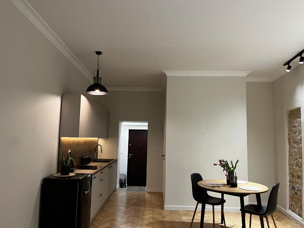 Kuchyň nebo kuchyňský kout v ubytování Apartamenty Rynek 5