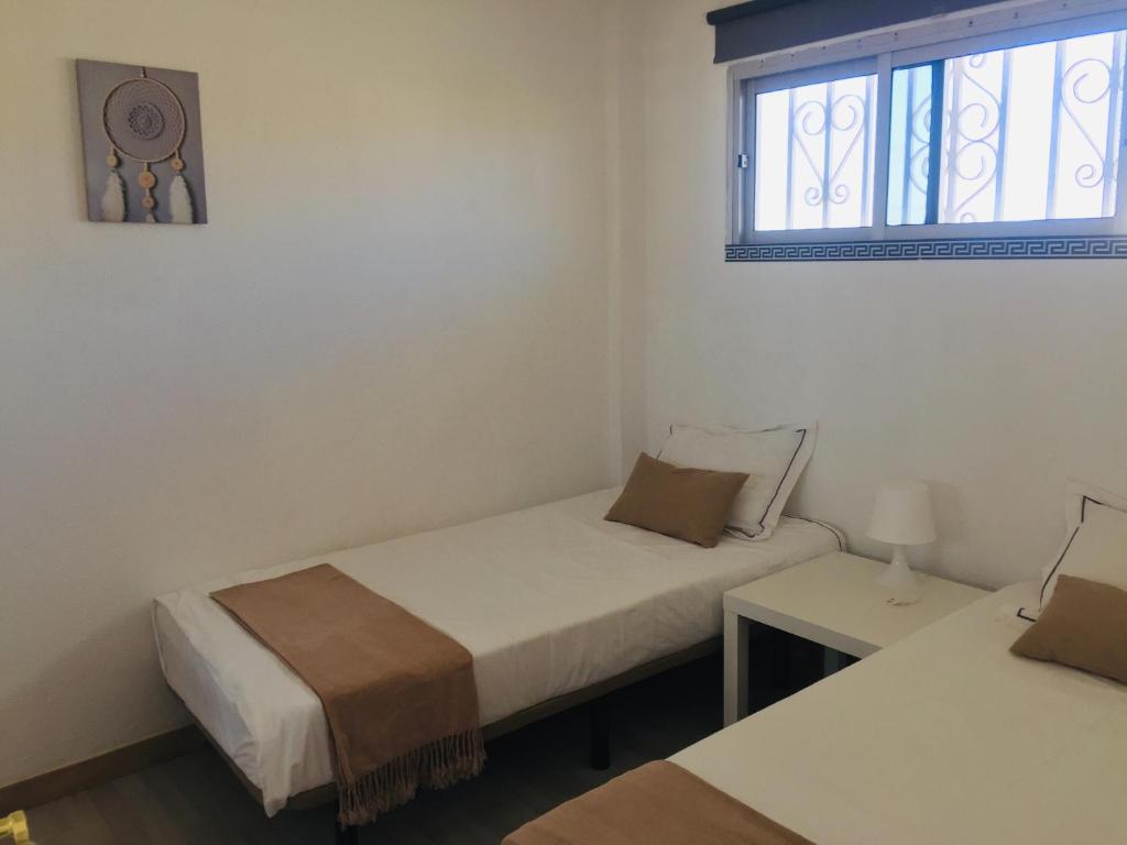 Posteľ alebo postele v izbe v ubytovaní Top floor sea view central holiday home