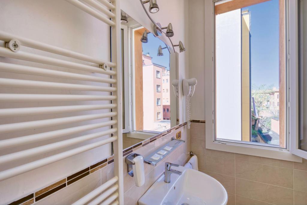 Koupelna v ubytování Hotel Astoria