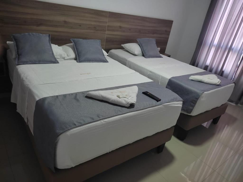 Postel nebo postele na pokoji v ubytování Hotel Terrazas Del Mar