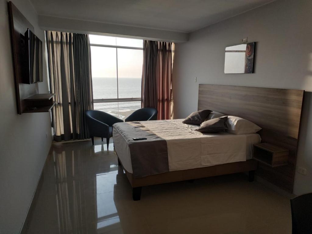 Postel nebo postele na pokoji v ubytování Hotel Terrazas Del Mar