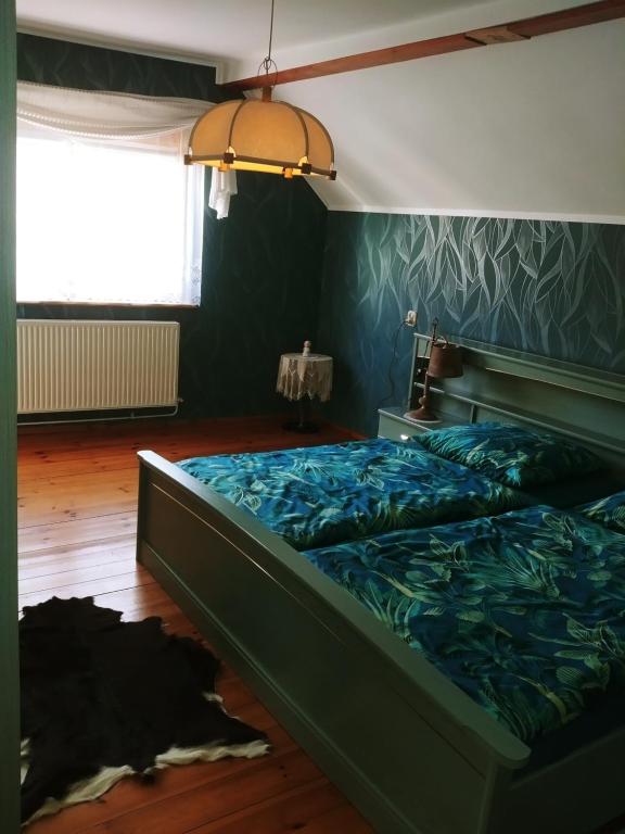 Posteľ alebo postele v izbe v ubytovaní Apartament w Górach