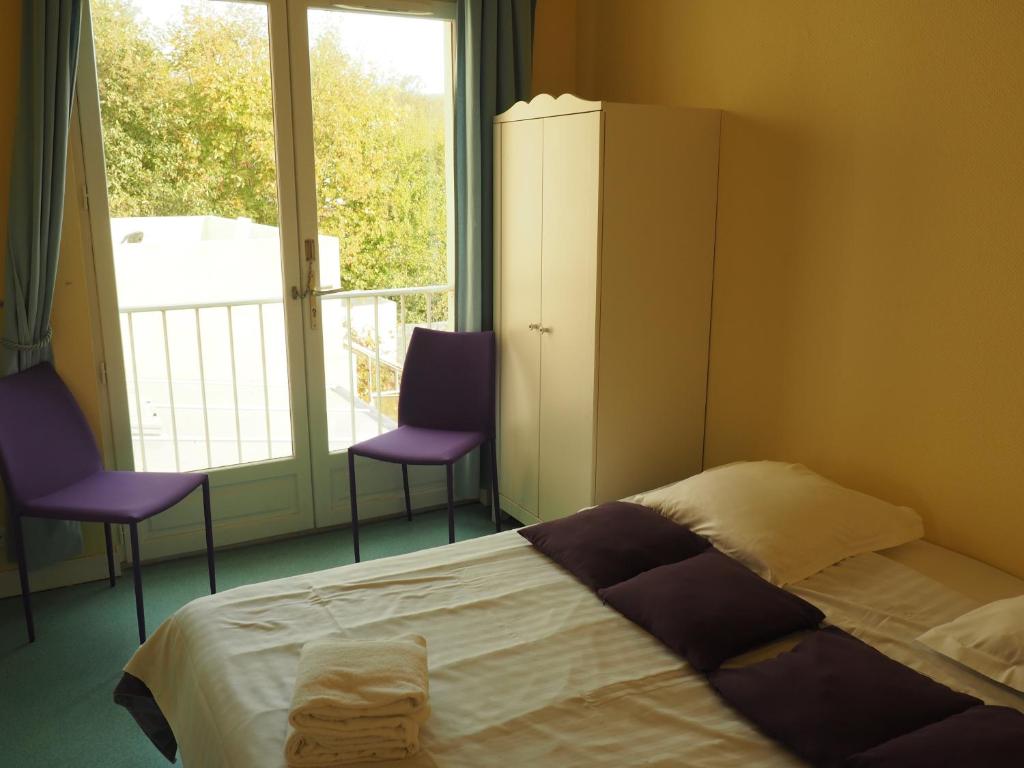 Postel nebo postele na pokoji v ubytování Hôtel Le Vivier WISSANT - Rivière