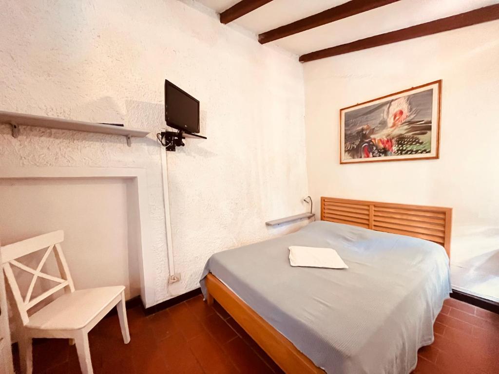 Telewizja i/lub zestaw kina domowego w obiekcie Hotel Baia di Levanto