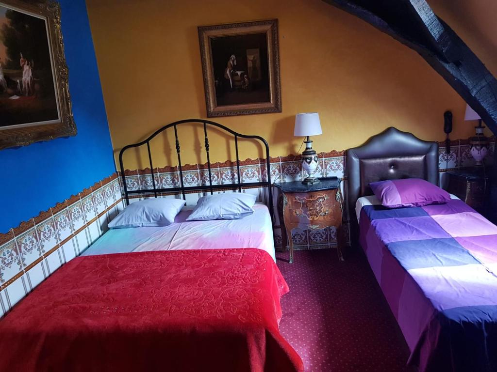 Postel nebo postele na pokoji v ubytování Hotel Mozart