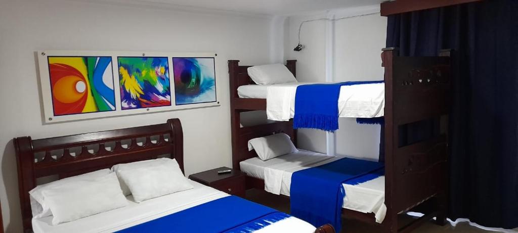 Postel nebo postele na pokoji v ubytování La Marina - Apartamentos Amoblados