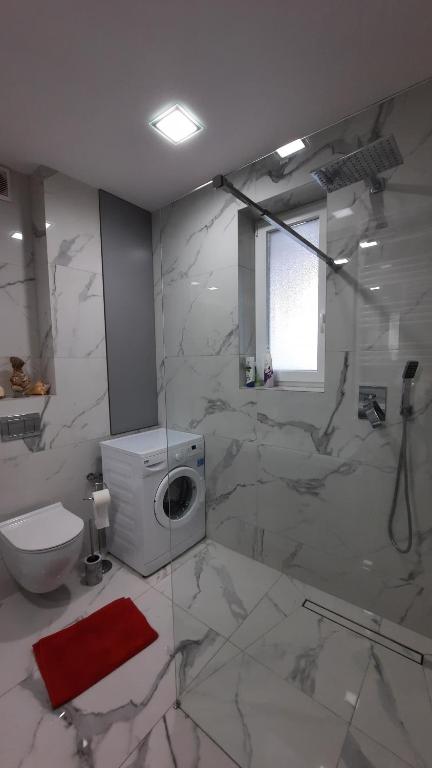 Kúpeľňa v ubytovaní Apartament Widok z tarasami